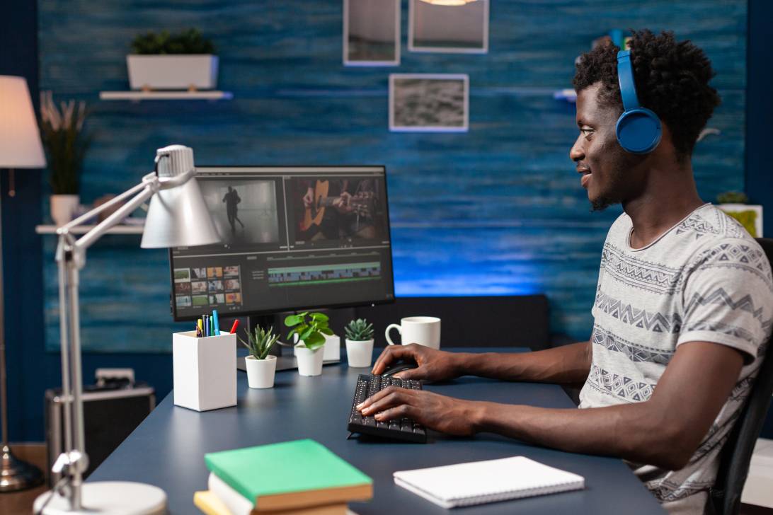 Videographer editing montage for SEO video marketing